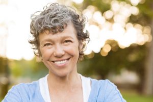 Learn more about the benefits of implant-retained dentures in Spring, TX.